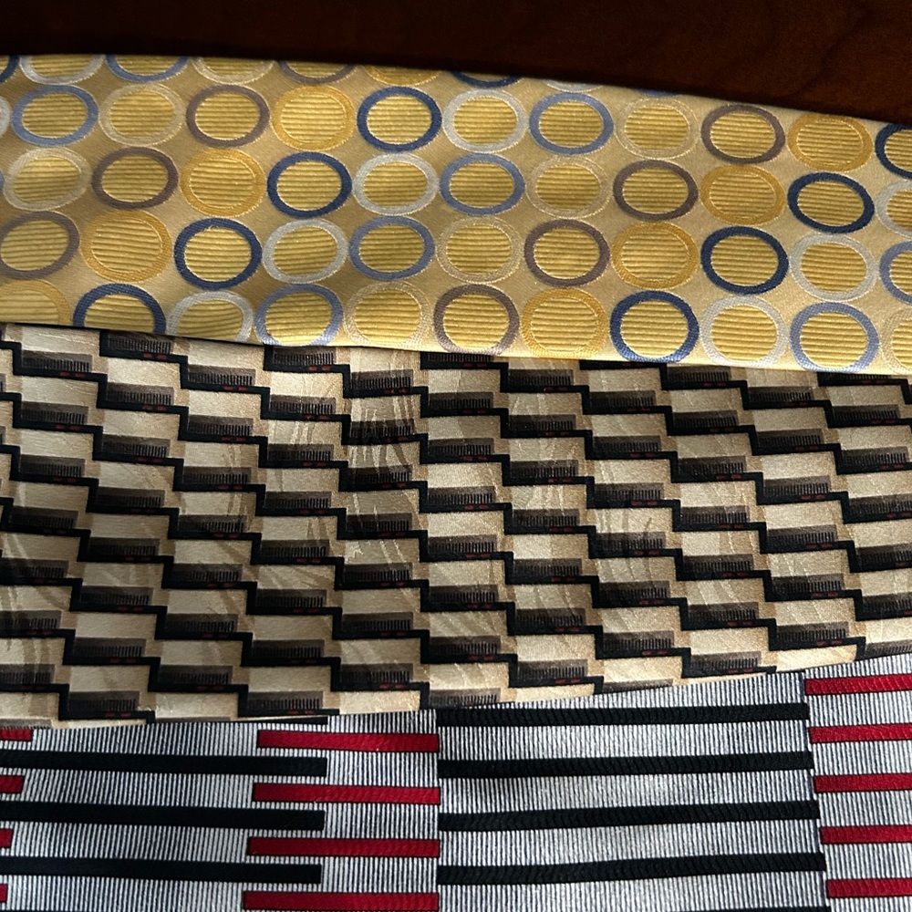3 new ties. Never worn. Beautiful colors.